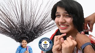 Cutting The Worlds LONGEST HAIR  Guinness World Records [upl. by Anirak]