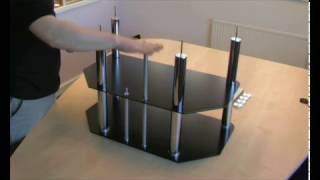 Assembling an SampC LCD Plasma TV Stand  How to Guide [upl. by Refinnej669]