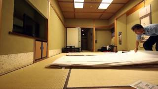 Making up a futon bed at Japanese traditional Ryokan [upl. by Rimhsak]