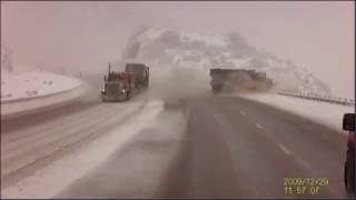 Semi truck sends snow plow over embankment in Utah canyon [upl. by Agarhs]