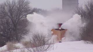 Watch snow drifts explode as train crashes through using old Illinois Central wedge plow [upl. by Ciryl]