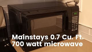 Mainstays 07 Cu Ft 700 watt microwave [upl. by Engapmahc]