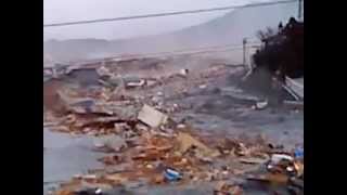 2011 Japan Tsunami ascending the river in Kesennuma extended [upl. by Eirellam]