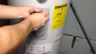 How To Reset The Reset Button On a Electric Hot Water Heater Pretty Easy [upl. by Nosraep103]