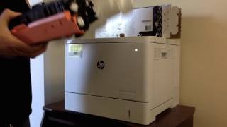 Changing the toner in the printer  HP Color Laserjet Enterprise [upl. by Nivri364]