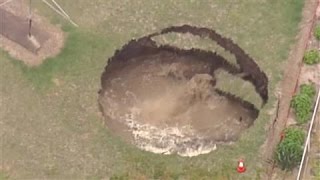 Giant Sinkhole Opens in Backyard [upl. by Nireves867]